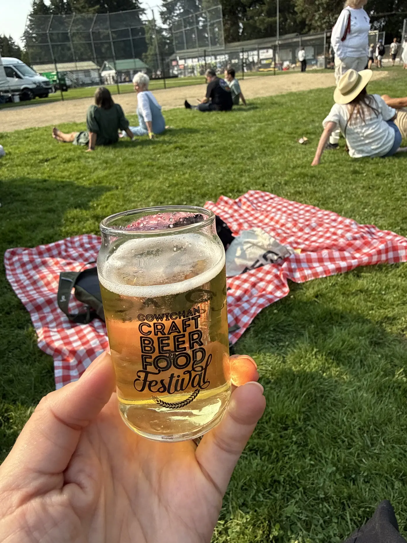 Keepsake tasting glass and tasting tokens from the 2026 Cowichan Craft Beer and Food Festival